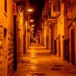 Solo female traveler exploring the historic streets of Florence, Italy