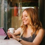 Blonde Italy blogger exploring scenic travel destinations in Italy