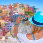 Senior Travel to Italy Elderly couple enjoying breathtaking views of Italy's iconic landmarks during their senior travel adventure