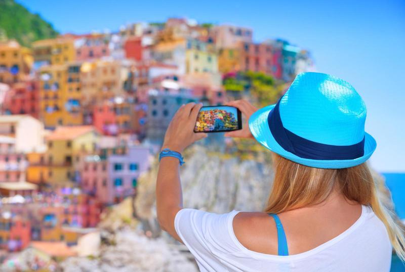 Elderly couple enjoying breathtaking views of Italy's iconic landmarks during their senior travel adventure