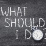 Solo traveler thinking and pondering whether to cancel travel plans to Italy