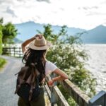 Adventurous woman enjoying the picturesque landscapes of Italy on a solo travel journey
